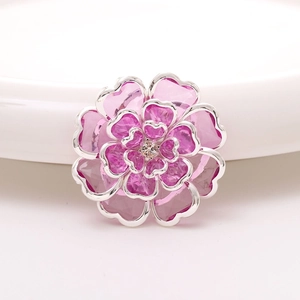Elegant pink acrylic camellia flower accessory with silver trim and crystal rhinestone center