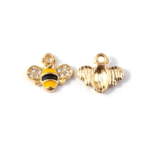 Detailed front and back view of gold bee pendant with yellow enamel and sparkling crystals