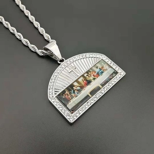 Iced out The Last Supper pendant necklace with silver rope chain and cross relief