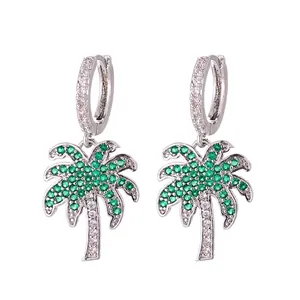 Elegant tropical palm tree drop earrings featuring green and white crystals on silver hoop