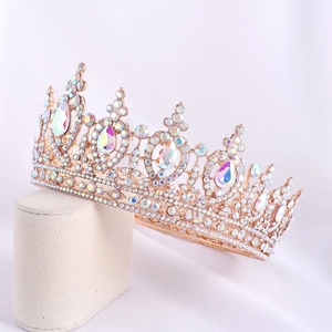Golden Baroque bridal crown with iridescent AB crystals and intricate rhinestone details