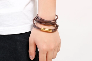 Brown braided multi-layer leather bracelet for men featuring a gold magnetic clasp