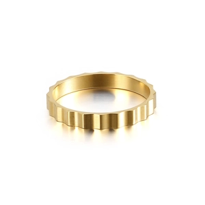 Minimalist golden titanium steel ring with irregular wave pattern and gear edge design