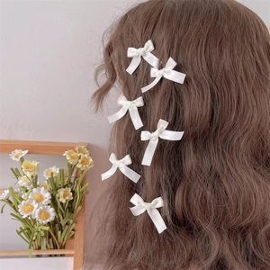 White silk satin ribbon bow hair clips set for women with sweet minimalist aesthetic