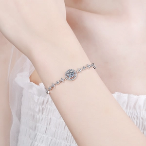 Classic S925 sterling silver bubble bracelet with round one-carat moissanite on wrist