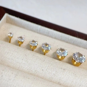 Set of six gold-plated titanium steel stud earrings with cubic zirconia in varying sizes
