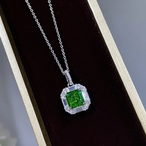 Luxury emerald green square pendant necklace with micro-paved crystals in silver