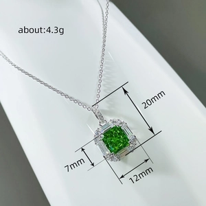 Luxury green square emerald pendant necklace with side baguette diamonds in silver finish