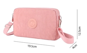 Borsa a tracolla in nylon rosa con tre zip, dimensioni di 19,5 x 12,5 x 4 cm