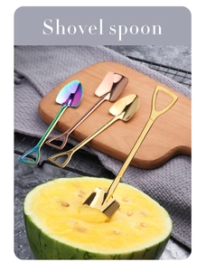 Set of colorful shovel-shaped dessert spoons in gold and rose gold for watermelon