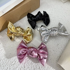 Metallic leather bow hair clips set in black gold silver and purple for girls