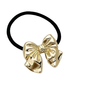 Elegant black high-elasticity hair tie featuring a polished gold alloy bow charm
