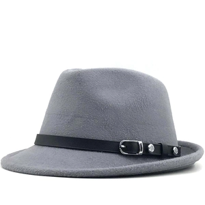 Detail of grey wool fedora hat featuring black leather belt with silver buckle decoration