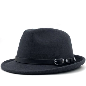Detail of black fedora wool hat featuring a leather belt strap with silver metal buckle
