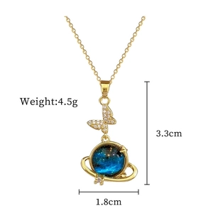 Titanium butterfly necklace with blue star stone and gold planetary ring pendant