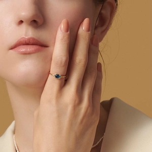 Vintage S925 silver ring with London blue topaz gemstone on a gold-plated band