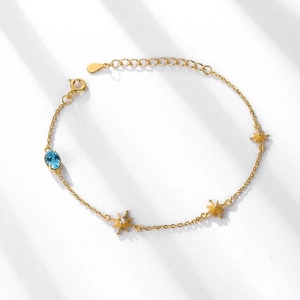 S925 sterling silver gold bracelet with Swiss blue topaz and star pendants