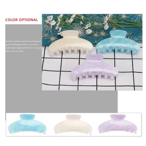 Large marbled acrylic hair claw clips in beige, light blue, and lavender purple