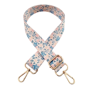 Adjustable floral print crossbody strap with gold metal buckles for bags and water bottles