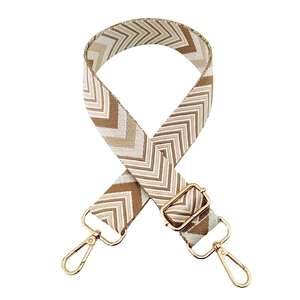 Adjustable beige and brown herringbone woven bag strap with pale gold lobster clasps