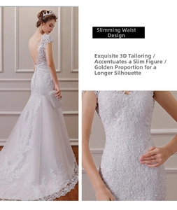 Detail of white lace bridal gown featuring open back design and slim fishtail silhouette