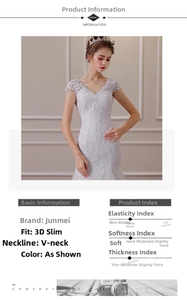 Detail of elegant V-neck lace wedding dress with floral embroidery and fitted silhouette