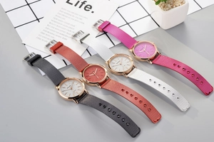 Close-up of stylish YOLAKO quartz watches with woven straps in various colors