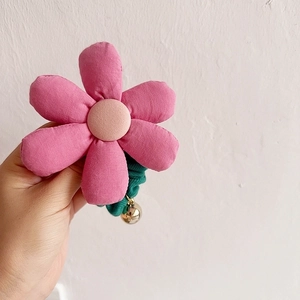 French style floral hair scrunchie with pink fabric flower and small gold bell accessory