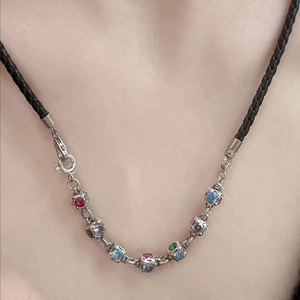 Rainbow gemstone pendant necklace with black braided rope and 925 silver clasp detail