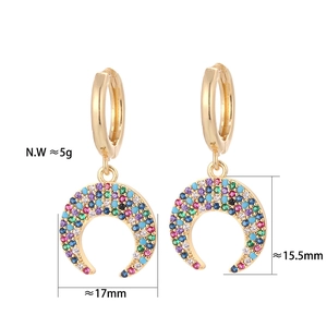 Close-up of golden crescent earrings with multi-colored cubic zirconia stones and dimensions