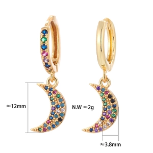 Detail of gold crescent moon earrings with colorful zircon and size measurements