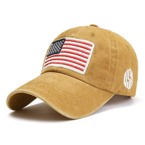 Vintage washed yellow cotton baseball cap featuring American flag patch and USA embroidery