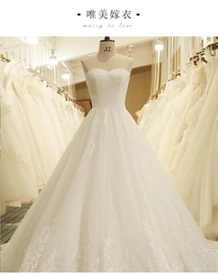 Abito da sposa a trapezio avorio senza spalline con pizzo delicato e strati di tulle leggero
