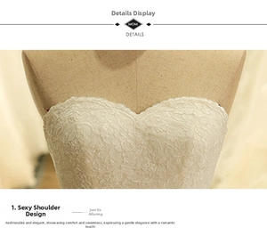 Dettaglio dell'elegante scollatura a cuore con pizzo floreale su un abito da sposa