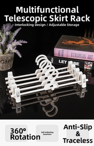 Detail of adjustable white pants hanger with 360 rotating hook and stackable clips