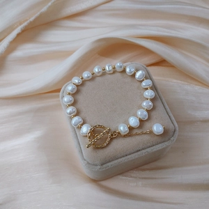 Close-up of baroque freshwater pearl bracelet with 14K gold-plated OT toggle clasp