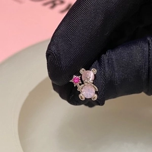 Pink gemstone teddy bear stud earrings with silver star wand in a sweet Y2K style