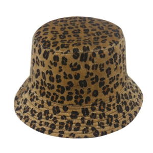 Close-up of thick plush fabric texture with classic leopard print pattern on bucket hat