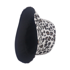 Detail view of double-sided bucket hat with leopard print and black lining contrast