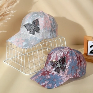 Lace floral baseball cap with rhinestone butterfly patch in soft pastel and dark colors