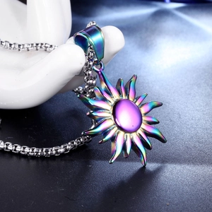 Rainbow sun pendant necklace with purple gemstone on silver chain jewelry piece