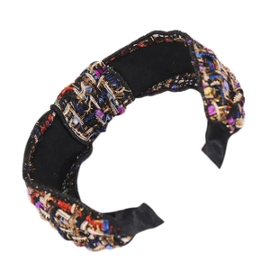 Elegant wide tweed headband with colorful metallic weave and a top knot design