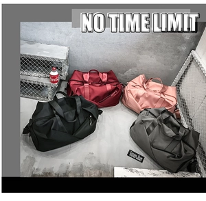 Detail of multi-color waterproof nylon sports gym bags with sturdy woven handles
