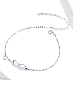 Detailed view of S925 silver infinity anklet featuring a polished solid heart charm pendant