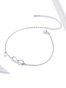 Detail shot of 925 sterling silver infinity and heart charm anklet with adjustable chain