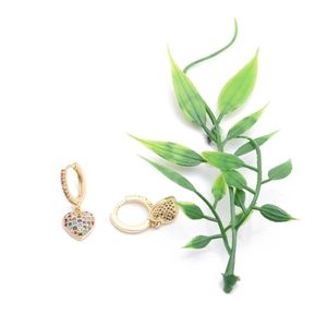 Golden hoop earrings with colorful zircon heart charms shown against a white background