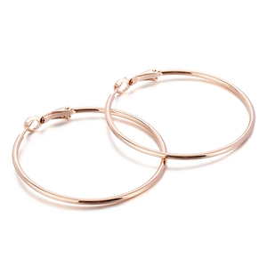 Boucles d'oreilles créoles minimalistes en acier inoxydable or rose avec fini poli