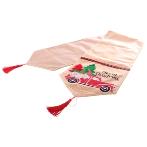 Christmas table runner with red truck, gnome print and tassels on linen fabric
