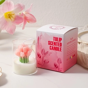 Tulip shaped scented candle in a glass jar with a pink flower gift box packaging