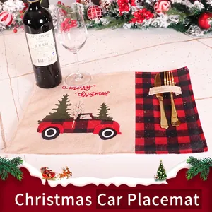 Christmas burlap placemat with red truck motif and cutlery holder for festive table decor